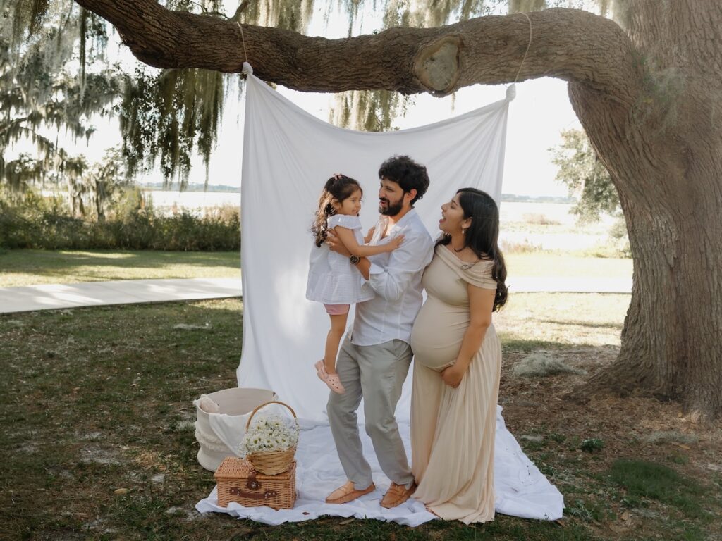 a maternity shoot taken at a park in Tampa, Florida